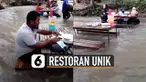 Para pelanggan tidak menghiraukan derasnya air sungai walaupun pakaian mereka hingga basah.
