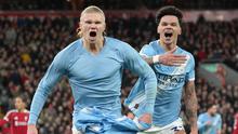 Pemain Manchester City, Erling Haaland, melakukan selebrasi setelah mencetak gol ke gawang Liverpool pada laga Liga Inggris di Stadion Anfield, Senin (9/2/2026) dini hari WIB. (AP Photo/Jon Super)