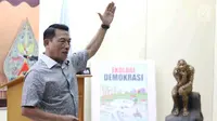 Mantan Panglima TNI Jenderal (Purn) Moeldoko menjadi pembicara dalam kuliah umum di Jakarta, Rabu (4/10). Dalam paparannya Moeldoko menyampaikan persoalan ancaman baik dari sisi global, regional, dan ancaman nasional. (Liputan6.com/Angga Yuniar)