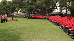 Suasana pelepasan kontingen atlet dan official Indonesia yang akan berlaga pada Asian Para Games 2018 di Halaman Istana Negara, Jakarta, Selasa (2/10). Para atlet di targetkan meraih 8 besar. (Liputan6.com/Angga Yuniar)