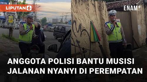 VIDEO: Bekerja Bersama Hati, Aksi Anggota Polisi Bantu Musisi Jalanan Nyanyi di Perempatan