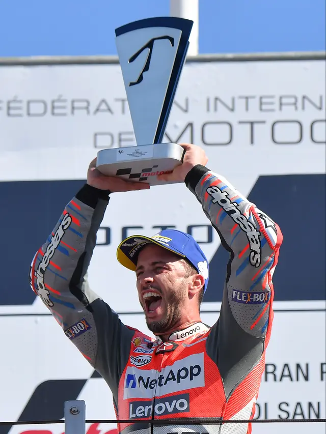 Aksi Pembalap Andrea Dovizioso Juara MotoGP San Marino