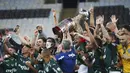 Pemain Palmeiras melakukan selebrasi usai menjuarai Copa Libertadores di Stadion Maracana, Minggu (31/1/2021). Palmeiras menang 1-0 atas Santos. (Ricardo Moraes/Pool via AP)