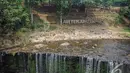 Nama air terjun tersebut adalah Air Terjun Teman.  Tingginya mencapai 12 meter dan lebarnya 20 meter, Sumatera Selatan, Jumat (10/10/2014) (Liputan6.com/Faizal Fanani)