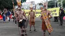 Koalisi berasal dari Perhimpunan Pembela Masyarakat Adat Nusantara (PPMAN), Pusaka Bentala Rakyat Papua, Greenpeace Indonesia, Satya Bumi, LBH Papua, Walhi Papua, Eknas Walhi, PILNet Indonesia, Lembaga Studi dan Advokasi Masyarakat (Elsam), serta Perkumpulan HuMa Indonesia. (Liputan6.com/Angga Yuniar)