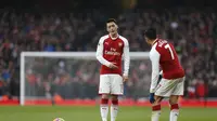 Penyerang Everton, Wayne Rooney, menyarankan Arsenal untuk menjual Mesut Ozil dan Alexis Sanchez pada bursa transfer Januari 2018.(AFP/Ian Kington)
