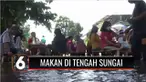 Makan di pinggir sungai sambil menikmati keindahan sungai sepertinya sudah biasa. Namun rumah makan yang satu ini, justru menawarkan makan di tengah sungai. Jadi bagaimana, sensasi makan dengan kaki terendam aliran sungai ?