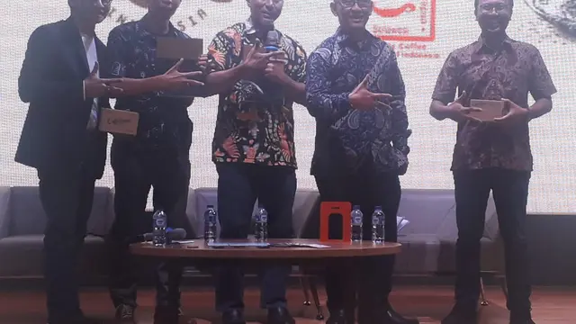 "Media Gathering: Promosi Kopi Indonesia Terpadu dan Penyerahan Buku Kopi di Auditorium Perpustakaan Nasional, Jakarta, Kamis (22/11/2018).