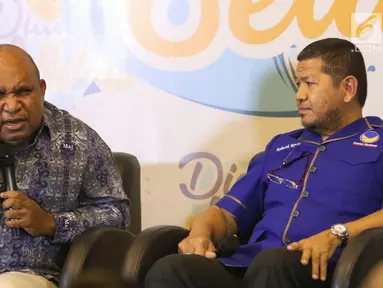 Bupati Lanny Jaya Befa Yigibalom dan Anggota DPR RI terpilih Fraksi Partai Nasdem Roberth Rouw menjadi pembicara dalam dialog Selasa di Jakarta Selasa (10/9/2019). Dialog mengusung Papua Bicara Papua: Dari Papua untuk NKRI mencari solusi masalah papua untuk keutuhan NKRI. (Liputan6.com/Angga Yuniar)