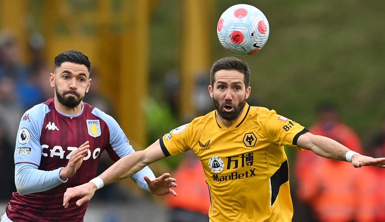 Joao Moutinho. Gelandang tengah Wolverhampton berusia 36 tahun ini sebenarnya sempat masuk dalam daftar skuad sementara yang berisikan 55 pemain. Ia juga mempunyai kelebihan dari segi pengalaman karena menjadi bagian Timnas Portugal pada Piala Dunia 2014 dan 2018. Bahkan saat Portugal menjuarai Euro 2016 ia pun menjadi salah satu pemain dalam skuad. Namun Fernando Santos berpandangan lain dengan tak menyertakannya daam skuad Portugal ke Piala Dunia 2022. (AFP/Ben Stansall)