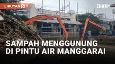 AKIBAT BANJIR KIRIMAN, SAMPAH KEMBALI MENGGUNUNG DI PINTU AIR MANGGARAI