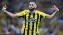 <p>Pemain depan Ittihad asal Prancis bernomor punggung 09, Karim Benzema, merayakan golnya selama pertandingan Liga Pro Saudi antara Al-Ittihad dan Al-Nassr di King Abdullah Sports City di Jeddah pada tanggal 6 Desember 2024. (AFP)</p>