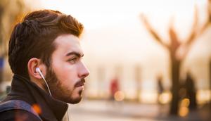 Ilustrasi mendengarkan lagu, musik. (Photo by Alex Blăjan on Unsplash)