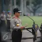 Kapolri Jenderal Pol Tito Karnavian memberikan arahan saat memimpin apel gelar pasukan ops Mantap Praja Jaya dalam rangka PAM Pilkada Serentak 2017 di Lapangan Monas, Jakarta, Rabu (12/10). (Liputan6.com/Faizal Fanani)