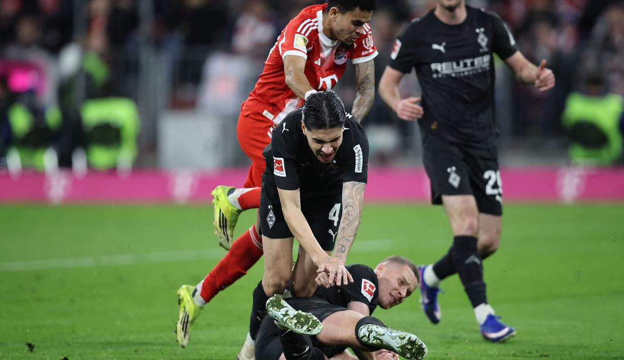 Diks dipercaya tampil sebagai Starting XI oleh Eugen Polanski untuk mengisi posisi bek kiri Borussia Mönchengladbach. (AFP/Alexandra Beier)