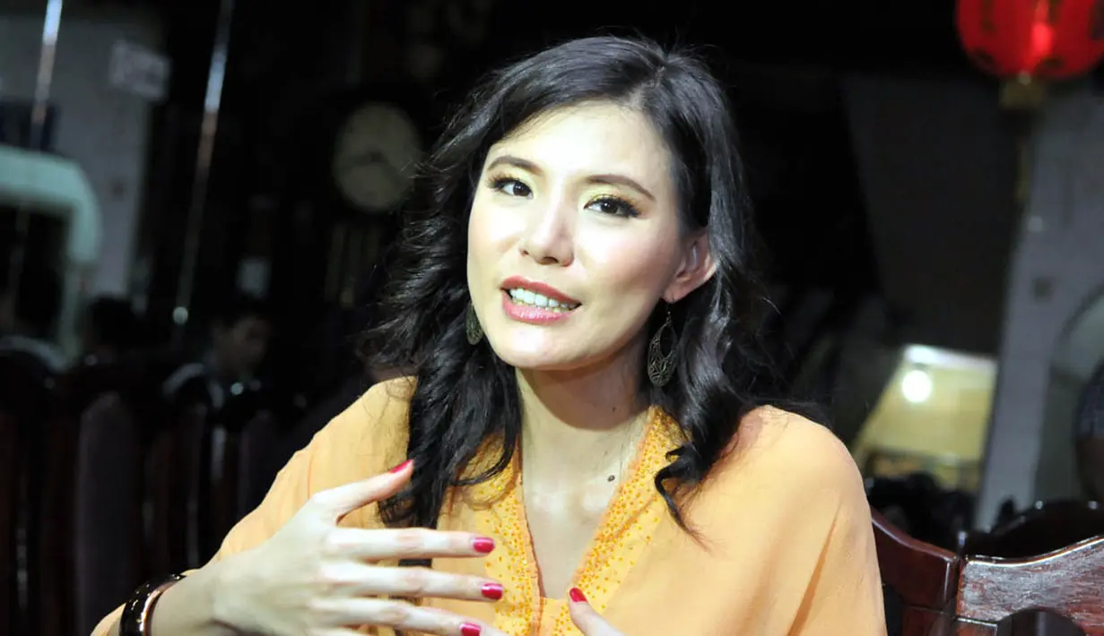 Menurut Olga Lydia golput tidak akan menyelesaikan masalah. Karena imbas dari kebijakan capres yang terpilih tetap akan dirasakan. Jakarta (31/5/14) (Liputan6.com/Panji Diksana)