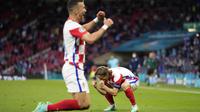 Tiga gol Kroasia yang diborong oleh Nikola Vlasic, Luka Modric, dan Ivan Perisic membuat Skotlandia tersingkir dari ajang Euro 2020 karena terdampar di dasar grup dengan nilai satu. (Foto: AP/Pool/Petr David Josek)