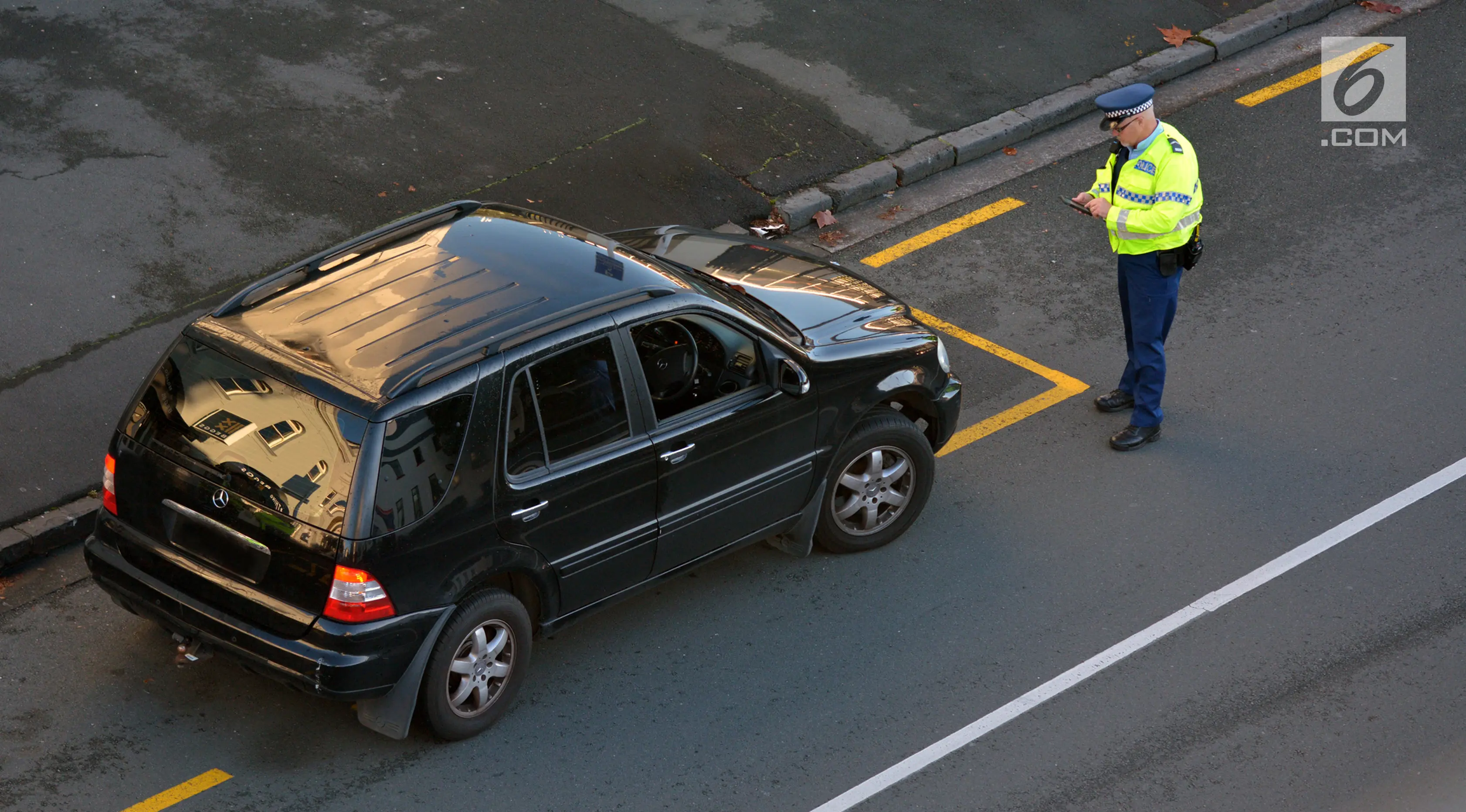 Ilustrasi Foto Tilang Mobil (iStockphoto)