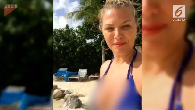 Maksud hati ingin mengajak selfie seekor burung Flamingo, wanita ini malah digigit.