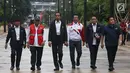 Presiden Joko Widodo (ketiga kiri) didampingi Menpora, Menteri PUPR, Kepala Bekraf, dan Ketua Inasgoc meninjau sejumlah venue Asian Games 2018 di Kompleks Gelora Bung Karno, Jakarta, Senin (25/6). (Liputan6.com/Angga Yuniar)