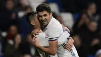 Real Madrid menang 6-1 atas Cultural Leonesa pada leg kedua 32 besar Copa del Rey di Santiago Bernabeu, Rabu (30/11/2016). Salah satu gol El Real disarangkan Enzo Zidane yang merupakan anak dari pelatih Madrid, Zinedine Zidane. (AFP/Javier Soriano)