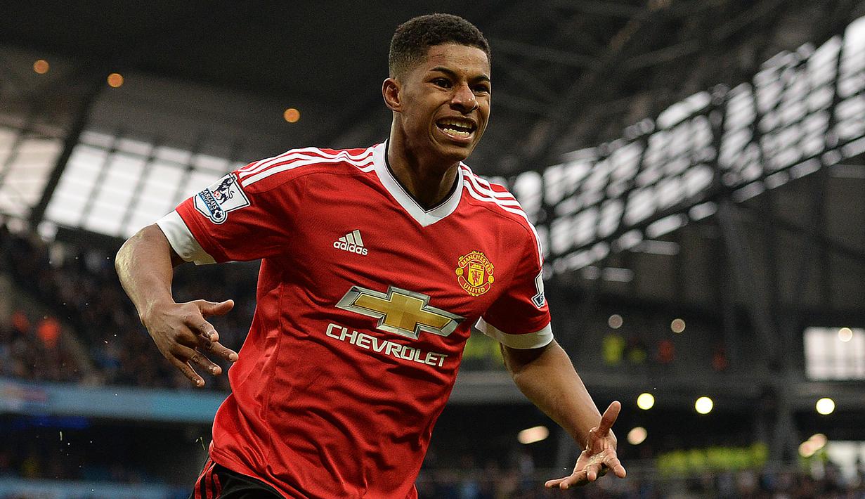 Marcus Rashford. Striker asli Inggris ini mencetak gol debutnya di Liga Inggris dalam usia 18 tahun 120 hari saat Manchester United menang 3-2 atas Arsenal pada Februari 2016 di Old Trafford. (AFP/Oli Scarff)