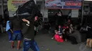 Pemudik sengaja berangkat lebih awal untuk menghindari penumpukan penumpang di saat puncak mudik Lebaran, Jakarta, Jumat (18/7/14). (Liputan6.com/Johan Tallo)