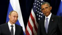 Presiden AS, Barack Obama dan Presiden Rusia, Vladimir Putin saat bertatap muka pada Sidang Umum PBB di New York, Senin (28/9/2015). (REUTERS/Kevin Lamarque)