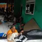 Sebanyak 143 kepala keluarga terdampak banjir di Dusun Kempek RT 05/02, Desa Karangligar, Kecamatan Telukjambe Barat, Karawang, masih bertahan di pengungsian. (Liputan6.com/ Abramena)