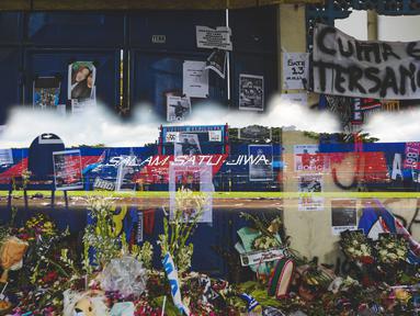 Mendung kelabu hampir selalu menyelimuti Malang di penghujung sore sepekan setelah tragedi pilu. Menggantung bak kenangan para penyintas kejadian maut usai Arema tumbang pada malam menuju minggu. (Bola.com/Bagaskara Lazuardi)