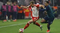 Striker Bayern Munchen, Harry Kane, saat bersua Arsenal pada laga leg kedua perempat final Liga Champions musim ini di Allianz Arena, Kamis (18/4/2024) dini hari WIB. Dalam duel itu, Die Bayern menang 1-0 dan lolos ke semifinal dengan agregat 3-2 atas The Gunners. (AFP/Michaela STACHE)
