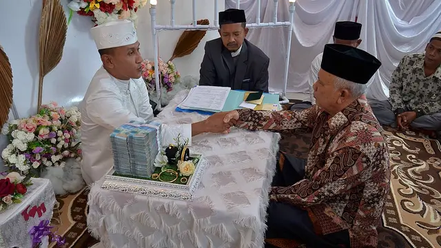 Brigadir TM. Saputra sedang mengulang ijab (Istimewa)