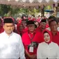 Reihana dan Aryodhia Febriansyah saat mendaftar ke KPU Bandar Lampung. Foto : (Liputan6.com/Ardi).