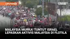 Ratusan warga Malaysia berunjuk rasa di depan Kedutaan Besar Amerika Serikat di Kuala Lumpur, Jumat (3/10). Mereka memprotes penahanan 23 aktivis Malaysia yang ada di kapal Flotila Gaza oleh Israel.