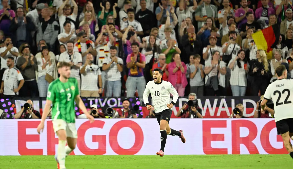 Gol kedua Jerman tercipta di menit ke-69 lewat aksi Nadiem Amiri. (INA FASSBENDER/AFP)