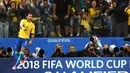 Selebrasi gol ala Neymar saat membawa Brasil mengalahkan Praguay pada Kualifikasi Piala Dunia 2018 di Sao Paulo, Brasil, ( 28/3/2017). (AFP/Nelson Almeda)