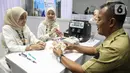 Bank Indonesia (BI) kembali membuka layanan penukaran uang periode III dalam rangka menyambut Hari Raya Idul Fitri 1446 Hijriah. (Liputan6.com/Angga Yuniar)