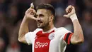 Dusan Tadic. Sayap kiri Serbia berusia 33 tahun yang kini memasuki musim ke-5 membela Ajax Amsterdam sejak didatangkan dari Southampton pada awal musim 2018/2019 ini tercatat telah mencetak 109 gol dan 128 assist dari total 270 laga di Eredivisie. Torehan tersebut didapat bersama 3 klub berbeda yang dibelanya di Eredivisie, yaitu Groningen, Twente dan Ajax Amsterdam. (AFP/ANP/Maurice van Steen)