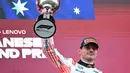 Kemenangan ini juga menjadi hadiah untuk pemasok mesin Red Bull Honda, mengingat balapan berlangsung di kandang mereka. (Toshifumi KITAMURA/AFP)