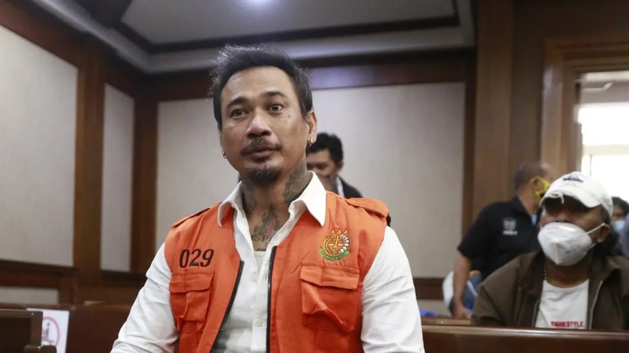 Musisi I Gede Ari Aryastina alias Jerinx saat menjalani sidang kasus dugaan pengancaman di Pengadilan Negeri Jakarta Pusat, Rabu (12/1/2022).