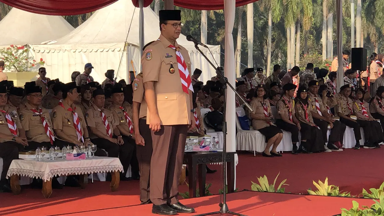 Gubernur DKI Jakarta, Anies Baswedan menjadi pembina upacara Hari Pramuka ke-58 di Lapangan Silang Monas Selatan, Sabtu (31/8/2019).