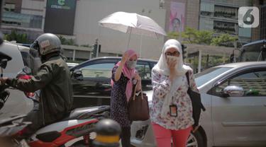 Potret Warga Jakarta Saat Dilanda Suhu Panas