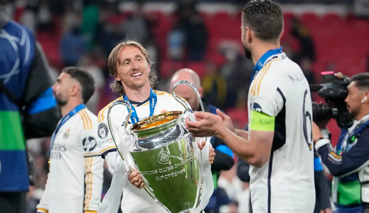 Hingga akhir pertandingan, skor tidak berubah 2-0 untuk kemenangan Real Madrid. (AP Photo/Kin Cheung)