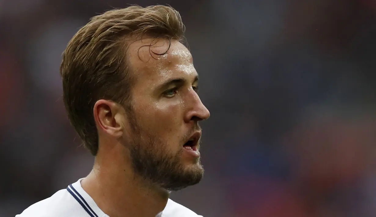 4. Harry Kane (Tottenham) - 6 Gol. (AFP/Adrian Dennis)