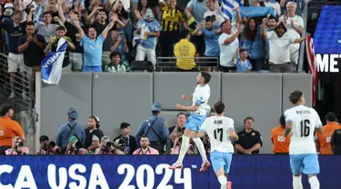 Gelandang Uruguay, Federico Valverde melakukan selebrasi setelah mencetak gol dalam pertandingan sepak bola grup C Copa America 2024 melawan Bolivia di Stadion MetLife di East Rutherford, New Jersey, pada 27 Juni 2024. (CHARLY TRIBALLEAU/AFP)