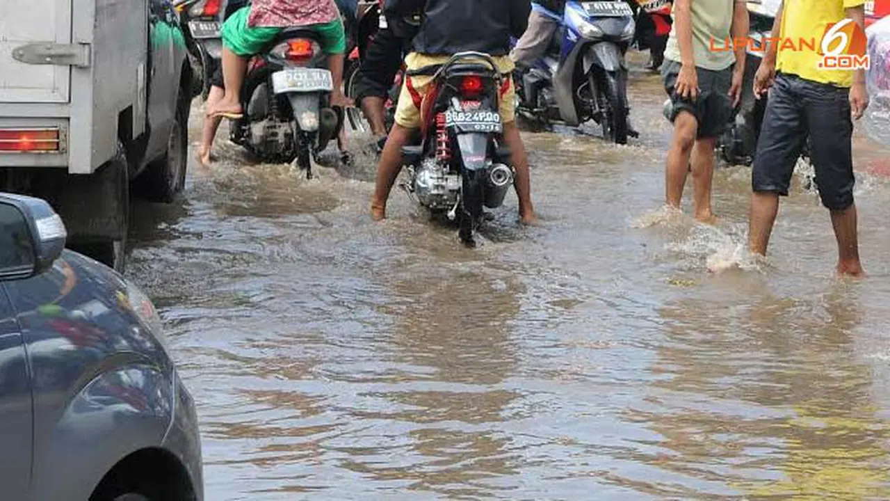 terendam-banjir-140130b.jpg