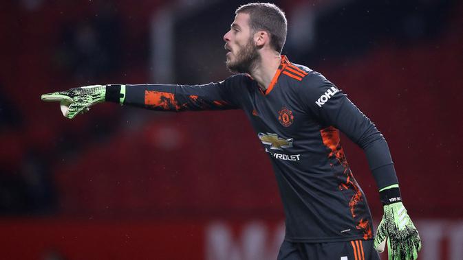 De Gea memiliki kemampuan untuk menampilkan performa yang lebih solid untuk Manchester United terutama lini belakang yang sering melakukan kesalahan. (Foto: AFP/Pool/Martin Rickett)