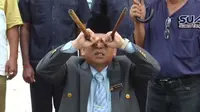 Dukun Malaysia, Raja Bomoh menggelar ritual atas kematian misterius saudara tiri pemimpin Korea Utara, Kim Jong-un, Kim Jong-nam. (Screen Grab)