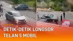 Longsor terekam dengan jelas dari arah balkon sebuah pertokoan.