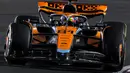 Pembalap McLaren, Oscar Piastri saat ajang balap Formula 1 GP Qatar 2023 yang berlangsung di Sirkuit Lusail, Qatar, Minggu (08/10/2023) malam WIB. (AFP/Karim Jaafar)